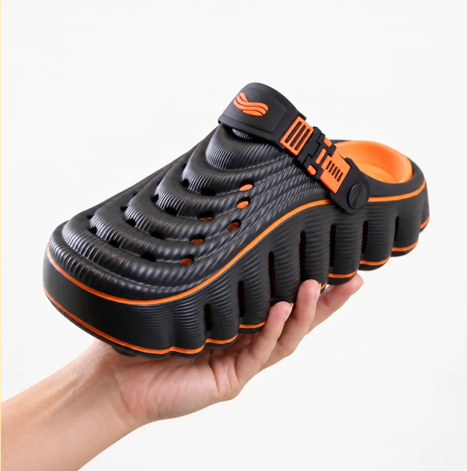 RESTORE Clog held in hand